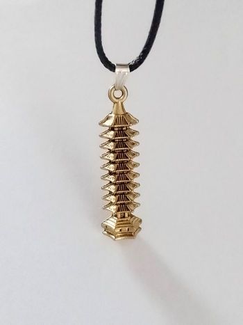 Collier corde de cire + pendentif chinois