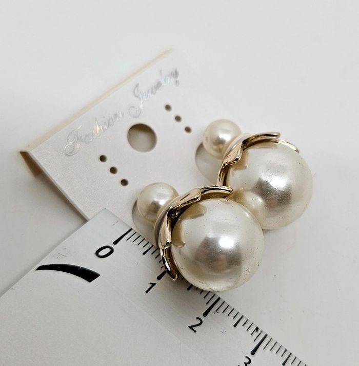 Paire de boucles d'oreilles.
Neuve. - photo numéro 5