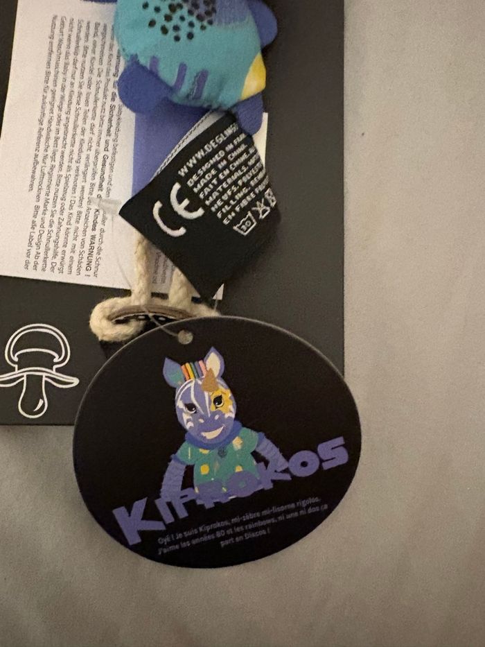 Attache tétine neuve les deglingos Kiprokos mi-zèbre, mi-licorne - photo numéro 3