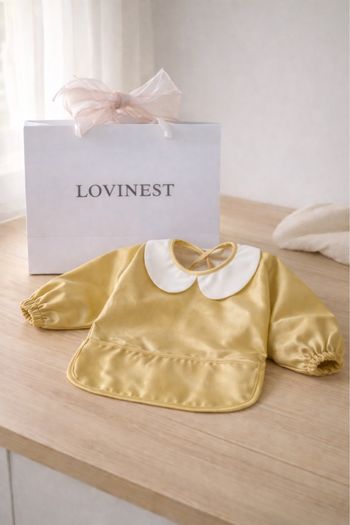 Bavoir avec manches Lovinest 