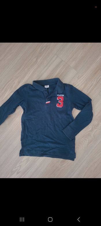 Polo manches longues tape à l'œil