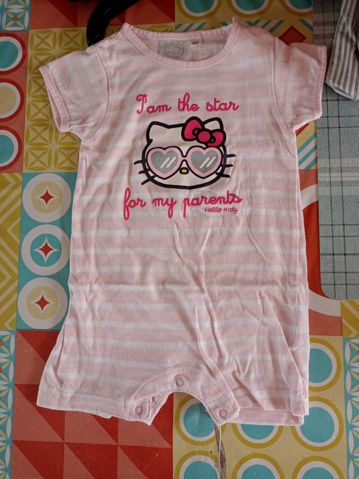 Combinaison rayée rose/blanche 9mois