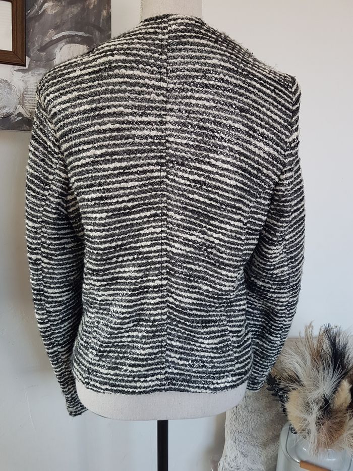 Veste noire et blanche brillante, matière épaisse. Eva Kayan. T42, 47cm aux aisselles, 53cm de haut. - photo numéro 3