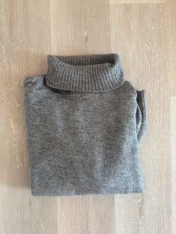 Pull col roulé