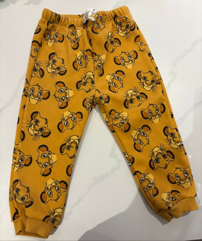 Pantalon/training molletonné moutarde/noir Simba Disney baby 36 mois