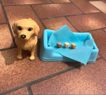 Maman chien et ces 3 petits 