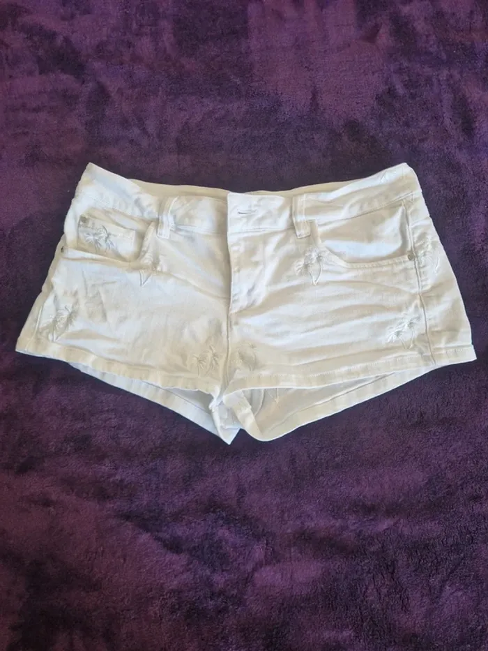 Short blanc Guess avec decor palmiers taille US 27