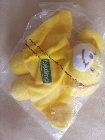 Chien  ou ours jaune  doudou Blédina  semi plat  vintage neuf  non ouvert