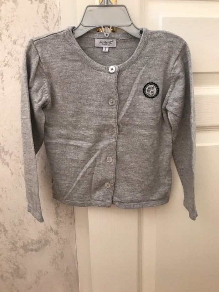 Gilet alphabet neuf taille 3 ans