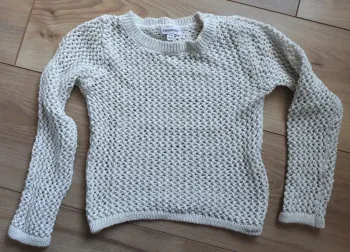 Pull maille fils dorés