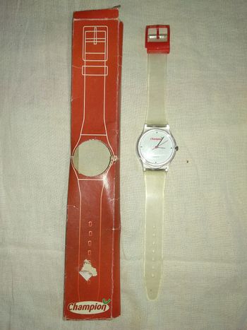 Montre publicitaire des anciens magasins Champion
