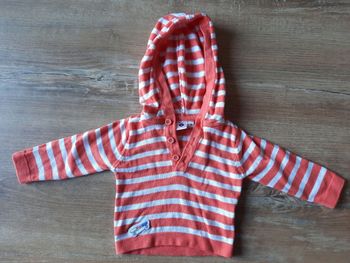 Pull rayé orange et blanc