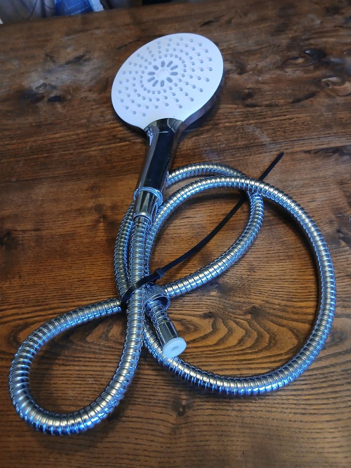 Pommeau de douche + tuyaux