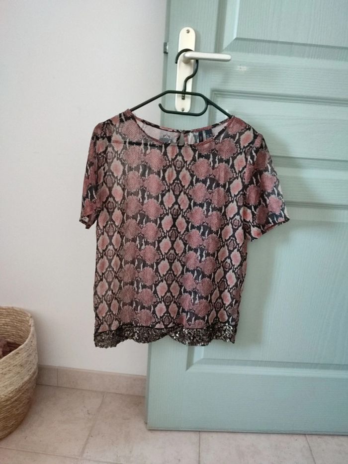Blouse serpent avec sequins en bas