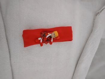 Bandeau avec petite poupée