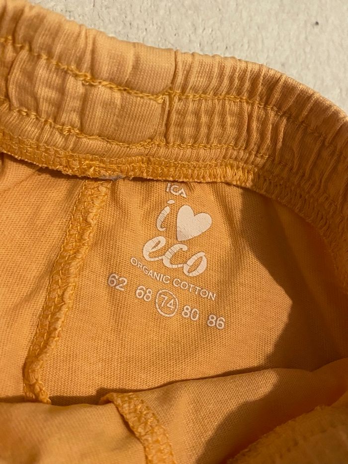 Legging orange fille 9 mois – Avec poches, très bon état - photo numéro 2