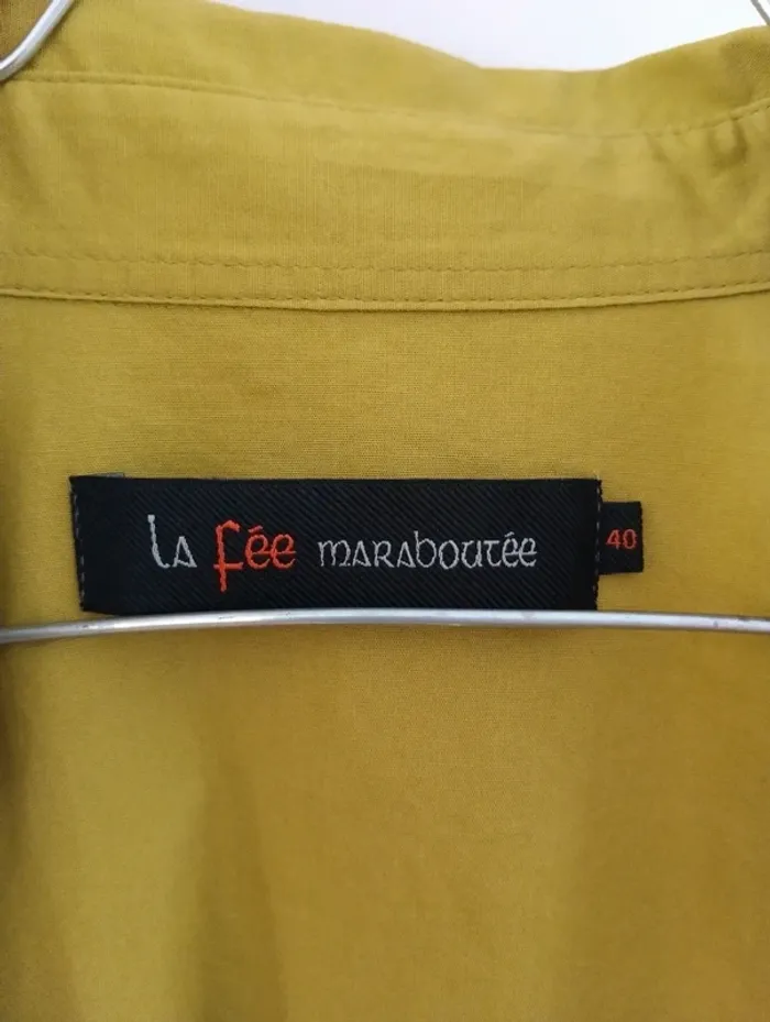 Blouse cache coeur vert olive
La fée maraboutée
Taille 40 - photo numéro 9