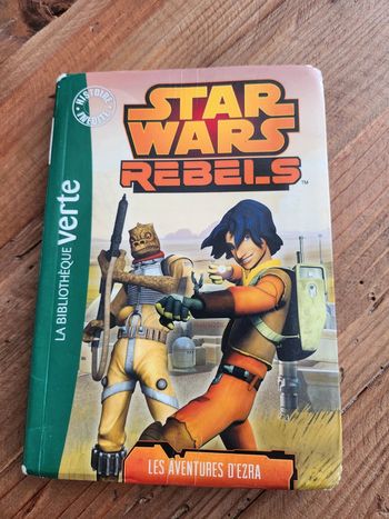 Livre Star wars rebels la bibliothèque verte en bon etat un peu ecorgné les aventures d Ezra