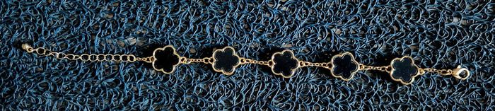 Bracelet fleurs dorée et noire - photo numéro 2