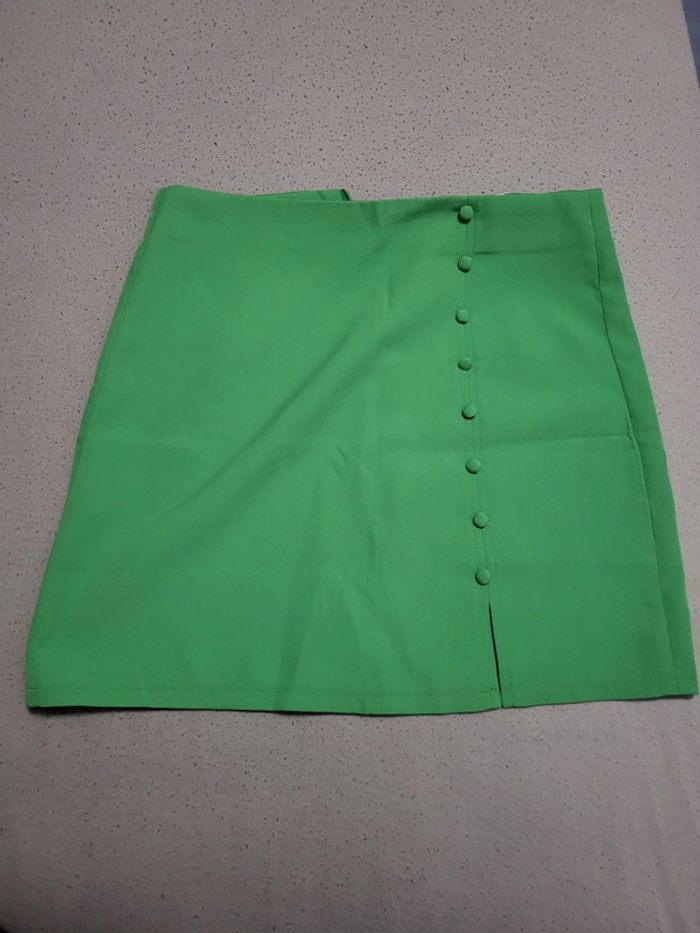 Magnifique jupe verte.