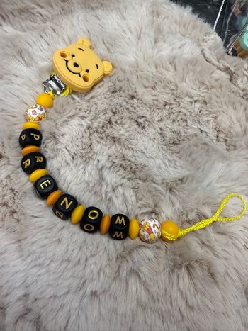 Attache tétine Winnie l’ourson 