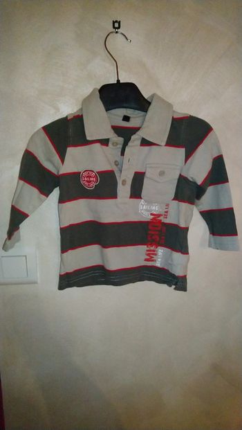 Polo manches longues en très bon état taille 18 mois