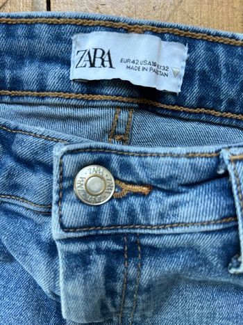 Jeans taille haute fentes en bas des jambes 42 Zara 