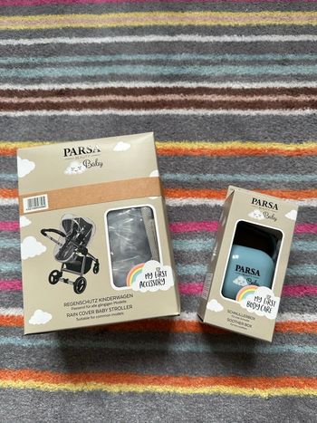 Habillage pluie + boîte à tétines NEUF