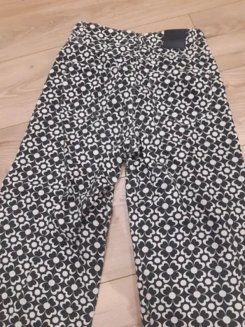 Pantalon large fleurs bicolore