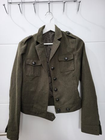 Une veste verte en très  bon état