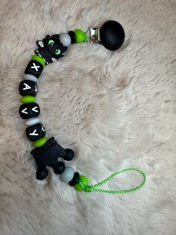 Attache tétine dragon