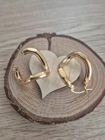 Jolie boucle d'oreilles torsadé en acier