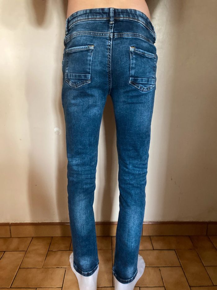 jean bleu déchiré - photo numéro 3