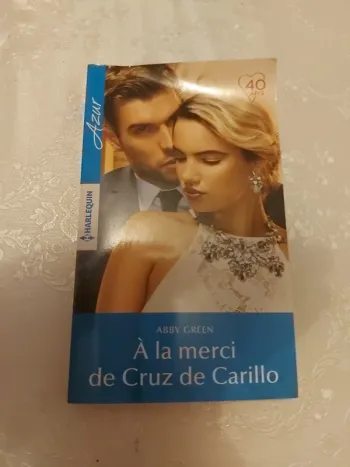 Livre Harlequin A la merci de Cruz de Carillo