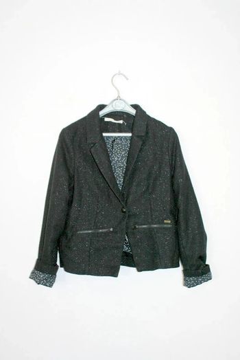 Veste Ikks pailleté taille S correspond à un 12 ans