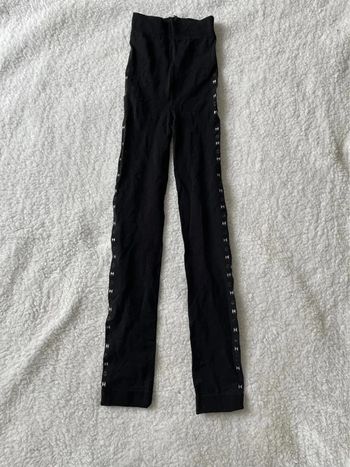 Legging collant noir épais à motifs sur les côtés