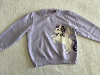 Pull licorne C&A taille 6 ans