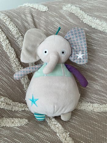 Peluche doudou musical 25cm p’tit bisou éléphant gris et blanc très bon état