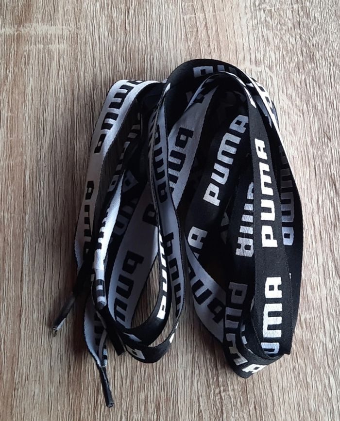 Lacets neufs Puma noirs et blancs - photo numéro 3