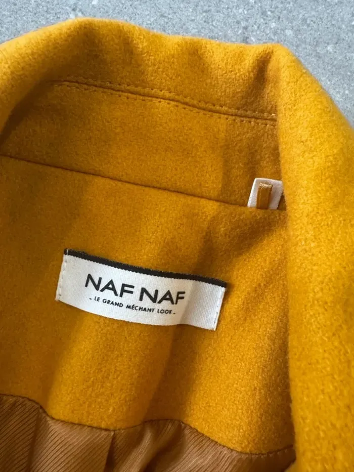 Manteau orange Naf Naf, il ya des traces sur les manches, taille 38 - photo numéro 2