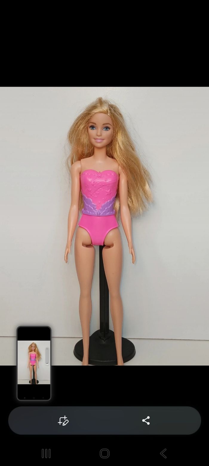 Poupée mattel barbie maillot fushia et mauve tête 2013 corp 2017 
Poupée et ensemble compris