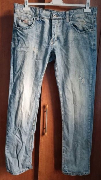 Jeans effet délavé et troués taille 48FR