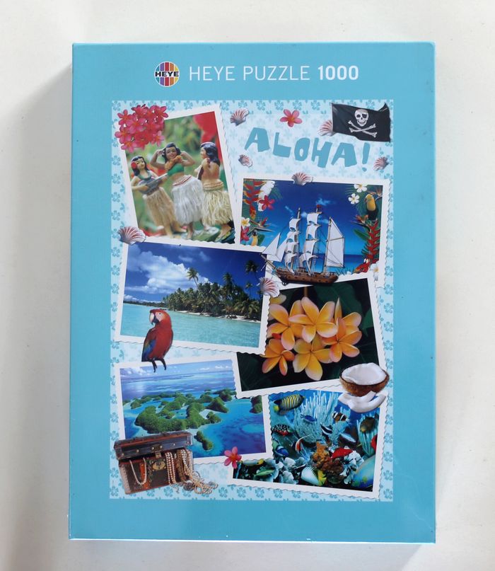 Puzzle neuf sous blister "Happy Holidays" 1000 pièces, marque Heye.