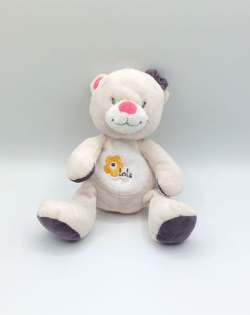 Peluche doudou ours Lola écru crème rose mauve fleur jaune 22 cm Arthur et lola