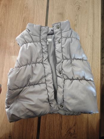 Doudoune sans manche 9 mois 
Parfait état