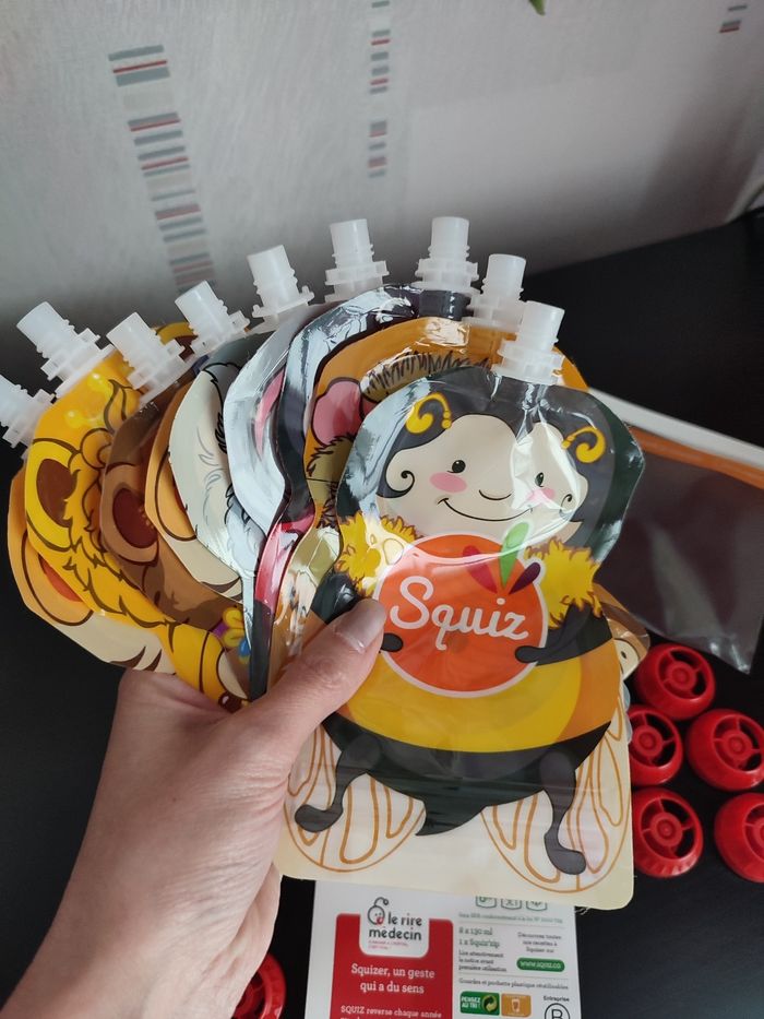 Lot de 9 gourdes réutilisables SQUIZ avec pochette - État Neuf
- photo numéro 10