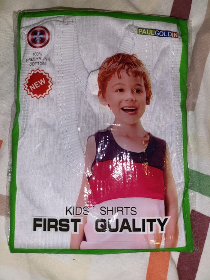 Débardeur blanc taille 5 ans