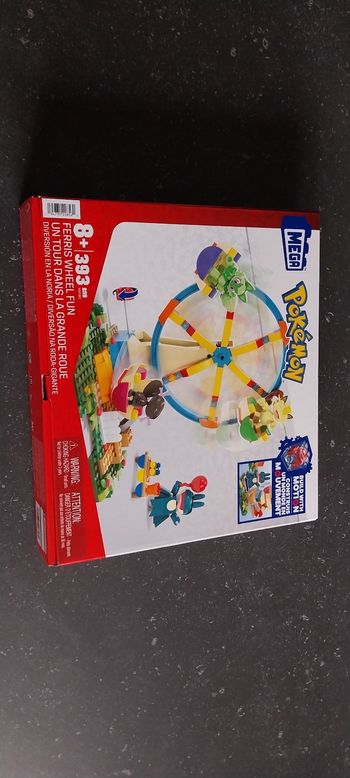 Un tour dans la grande roue pokémon 8+ Mega