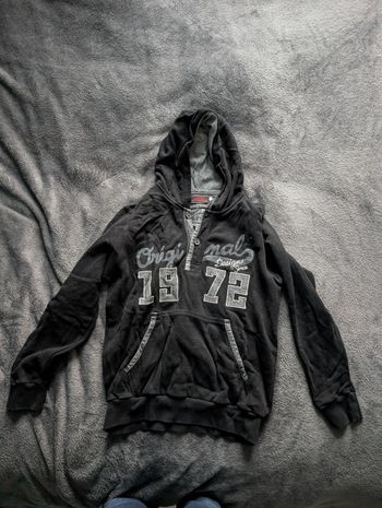 Pull catimini noir taille 14 ans