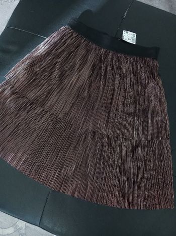 Jupe brillante pas dore